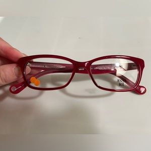 Anna Sui zyl eyeglass frames. Red plastic eye glasses.